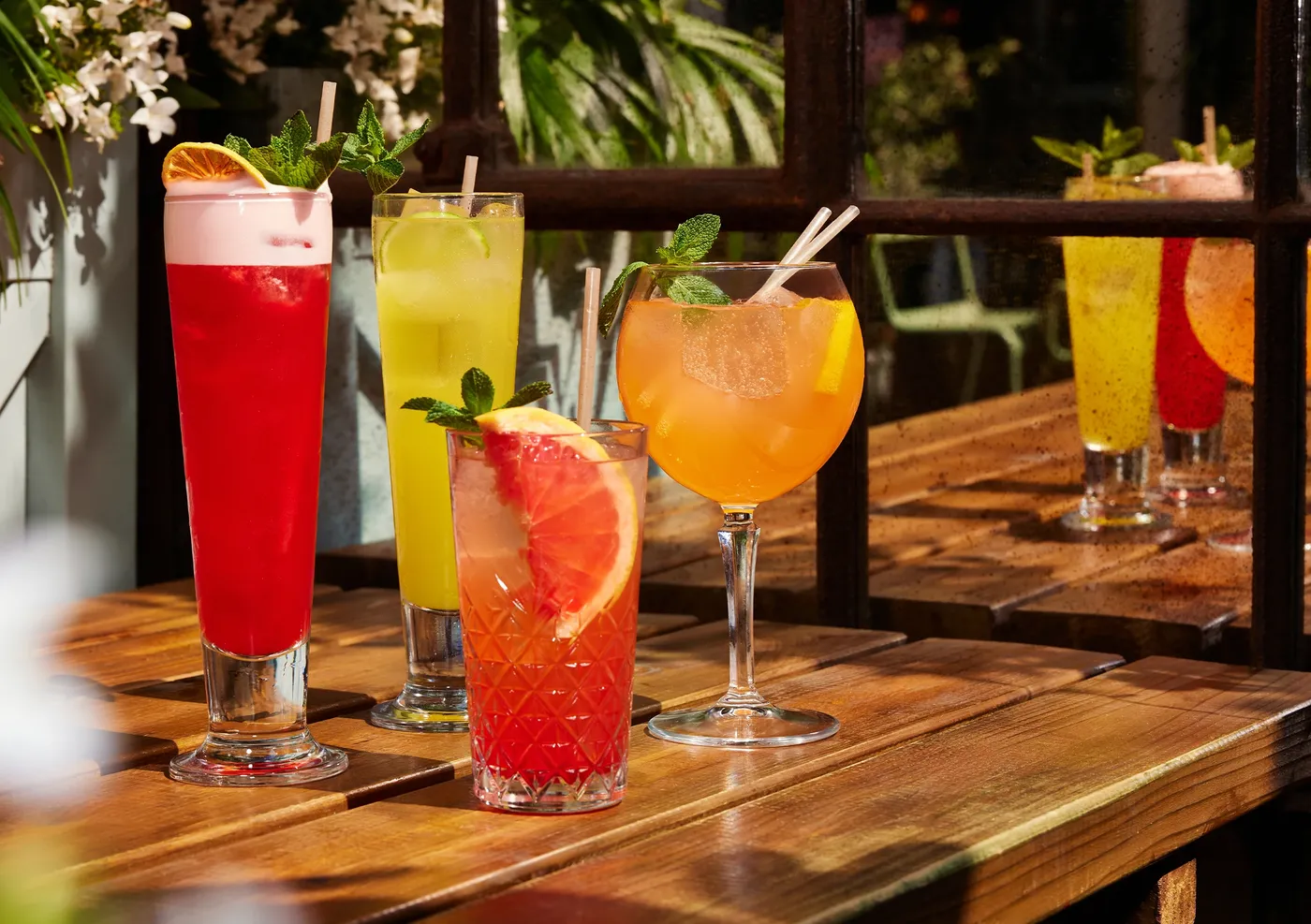 summer cocktails on a flight club outdoor terrace
