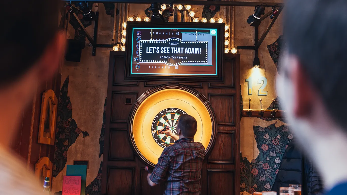 games screen showing an action replay whilst a player collects his darts