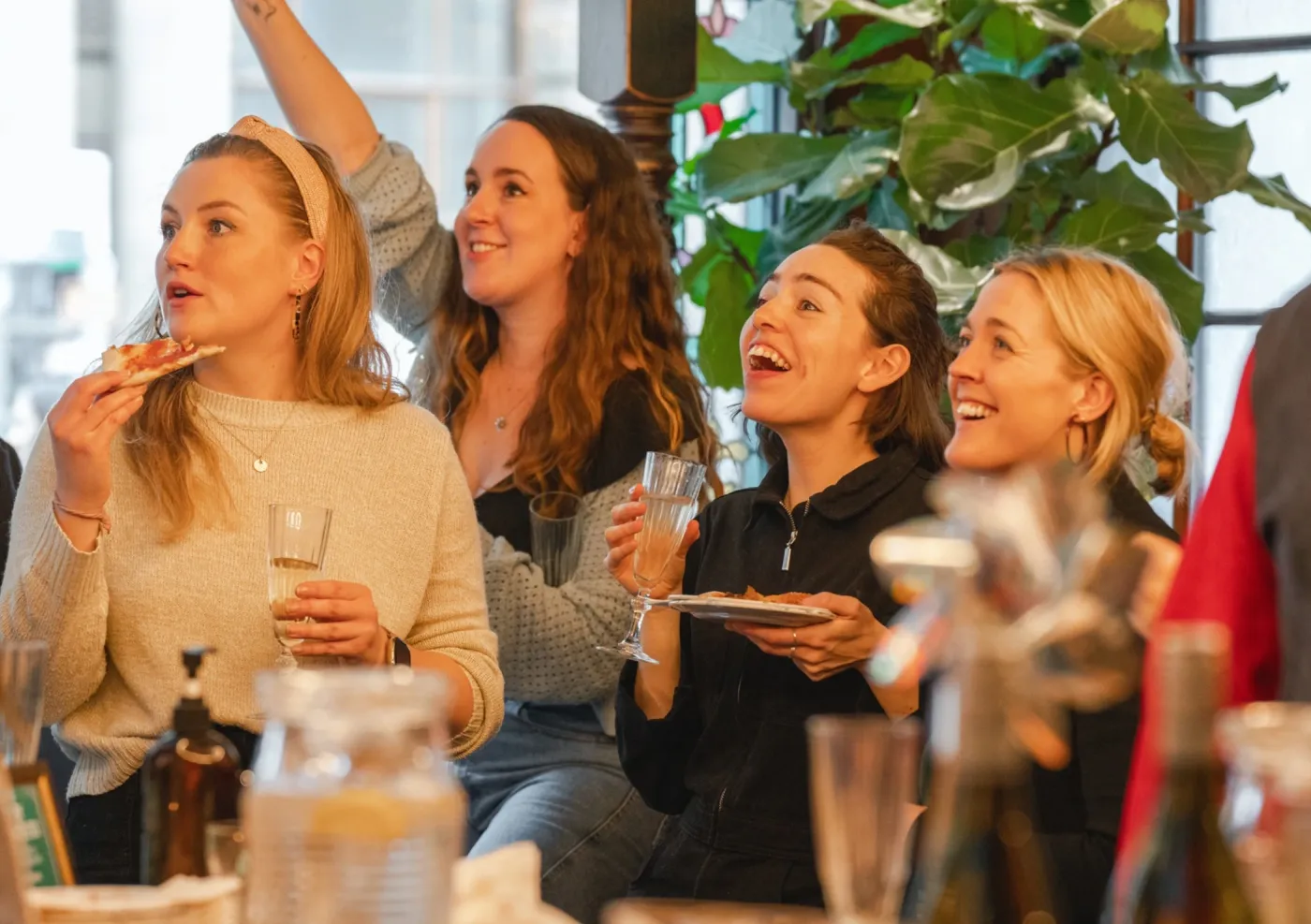A group playing darts at a Brunch Social in Flight Club