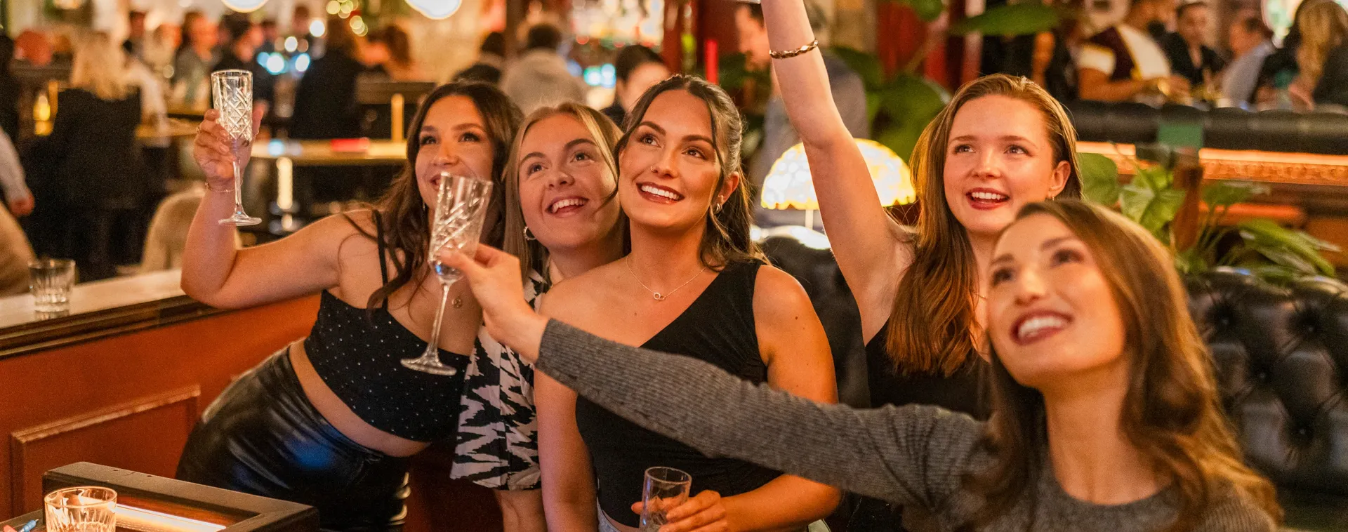 A group enjoying a Brunch Social in Flight Club