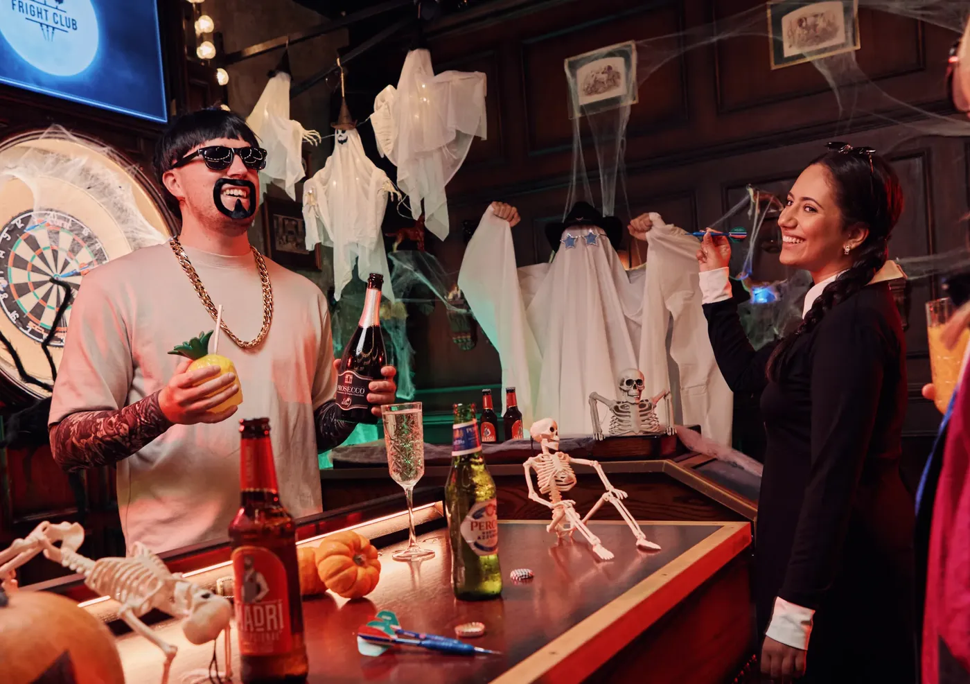 A group of people in Halloween costumes at Halloween Brunch